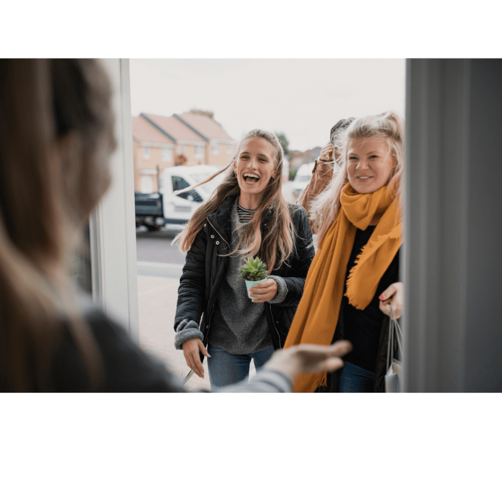 Homeowner opens door to receive two guests